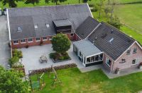Vrijstaande woning met ca. 3.925 m² eigen grond in Roderwolde